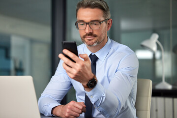 Poster - Business man, phone and boss at a office with networking online at a company. Reading, scrolling and male person at desk with mobile management and communication at a workplace with social media