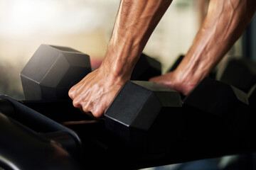 Poster - Hands, training and man exercise with weights in a gym for strength, wellness and health for workout routine, Sport, muscle and closeup of person with dumbbell for power lifting of strong bodybuilder