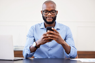 Poster - Black man, phone and desk in office with search on internet for networking, email or social media. Online research, digital marketing and businessman with glasses, cellphone and laptop at start up.