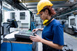 © Westend61 - Maintenance engineer working in factory using robotics