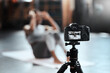 © Beaunitta Van Wyk/peopleimages.com - Recording, fitness and woman with a camera, exercise and training with form, vlogger and influencer. Female person, girl and athlete with health, live streaming workout and wellness with technology