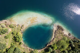Fototapeta Sypialnia - Particular aerial view of the Accesa lake Grosseto