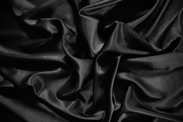 Fototapete - Black silk satin texture background.