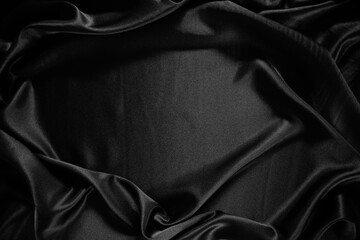 Fototapete - Black silk satin texture background.