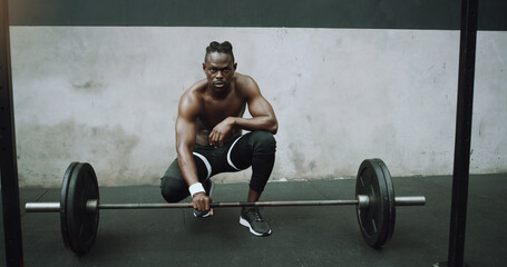 Wall Mural - Weightlifting, fitness and portrait of black man with barbell in gym for training, exercise and workout. Strong body, muscle and male bodybuilder lift weights for challenge, wellness and strength