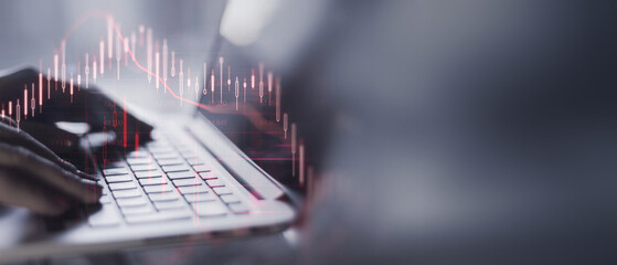 Businesswoman in a office analyzes complex crisis market data on a dlaptop. Detailed financial graphs indicate a high-pressure, data driven work environment, forex background