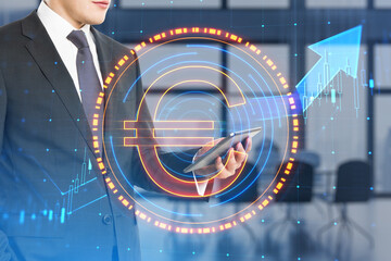 Poster - Headless businessman using smartphone with digital round euro sign on blurry office interior background. Online banking, cryptocurrency and finance concept. Double exposure.
