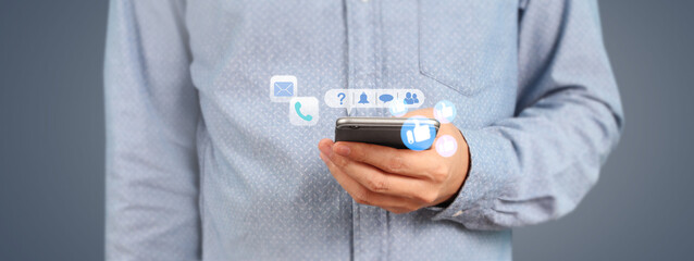 man holding smartphone device touching screen