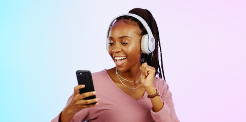 Canvas Print - Dance, music and headphones with black woman and phone in studio for freedom, streaming and online radio. Happiness, technology and relax with girl dancing to track, songs and audio on background