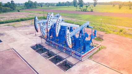 Wall Mural - Top view In the field crude oil country industry the oil rig pump in the evening of the pumping unit