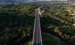 © ADDICTIVE STOCK - Picturesque drone view of long road bridge