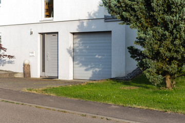 Wall Mural - garage carport on a modern house facade