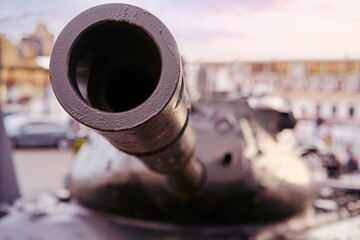 Cannon gun barrel with round hole close-up, traditional fort guard weapon.