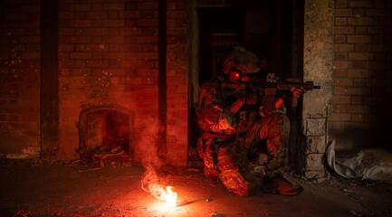 Soldier in anti-terrorist warfare in a dark building, Anti-terrorist operation training on the battlefield