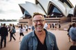 © Leon Waltz - Medium shot portrait photography of a grinning man in his 40s that is smiling with friends at the Sydney Opera House in Sydney Australia . Generative AI