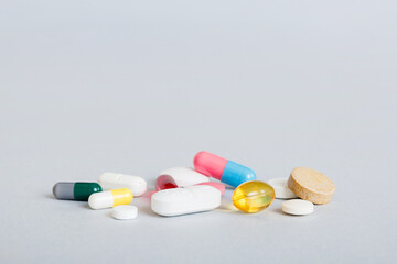 Many different colorful medication and pills perspective view. Set of many pills on colored background