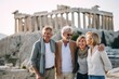 © Anne Schaum - Happy senior couple with their adult daughter visiting ancient temple of Olympian Zeus in Athens, Greece