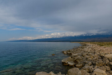 Wall Mural -  Issyk-Kul - lake in Kyrgyzstan. Summer mountain landscape. Kyrgyzstan mountains.