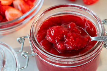 Wall Mural - Preparation and preservation of strawberry jam in a glass jar