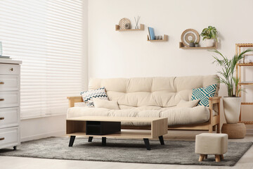 Sticker - Stylish living room interior with comfortable sofa and side table