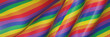 © Kavik - 3D Wavy rainbow flag. LGBTQ color.