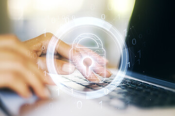 Aufkleber - Creative idea concept with lock symbol and microcircuit illustration and hands typing on laptop on background. Protection and firewall concept. Multiexposure