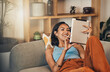 © Courtney Haas/peopleimages.com - Woman relax on couch with tablet, online streaming with internet and reading ebook or watching film at home. Happy female person with technology, subscription and mobile app with break in living room