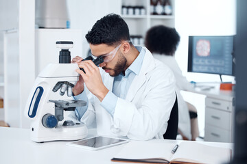  Science, microscope and male scientist analyzing with biotechnology in a medical laboratory. Particles, pharmaceutical and man researcher working on scientific project for healthcare innovation.