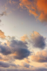 Wall Mural - evening sky in orange glow. huge fluffy clouds. dramatic natural background