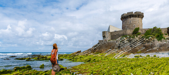 Wall Mural - Woman tourist in France, Ciboure, Saint Jean de Luz near Biarritz- Basque country