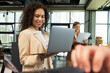 © Atlas - Young people working in office, coworking and office concept