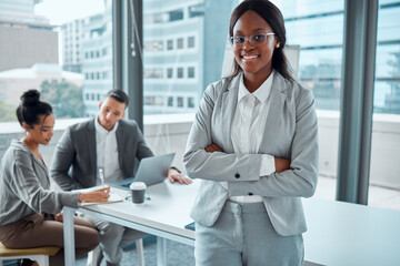 Portrait, arms crossed and black woman, lawyer and entrepreneur in meeting. Face, glasses and business smile of African female law professional with confidence, career pride and leadership in office.