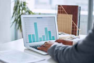 Poster - Hands typing, laptop and chart in office for finance, economy or stock market analysis with software. Man, computer and graph for big data analytics, accounting and cloud computing with dashboard ux