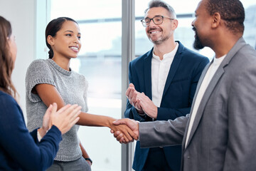 Business people, handshake and clapping in meeting celebration, success promotion or HR thank you. Corporate partnership, woman shaking hands and b2b onboarding, congratulations or career welcome