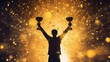 © Balerinastock - Successful man holding up a shining gold trophy