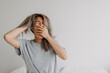 © Sevendeman - Funny face sleepy head asian woman just wake up in the morning dizzy and lazy.