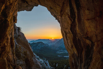 Wall Mural - Sunset in the Sierra del Malladar since mil homens cave near the penyo roc and el pas of the contador. In the province of Alicante, Benimantell, Spain.