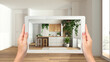 Augmented reality concept. Woman hands holding tablet with AR application used to simulate furniture and design products in empty wooden interior, urban jungle kitchen