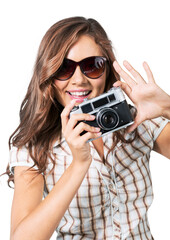 Wall Mural - Young woman taking photos with vintage film camera