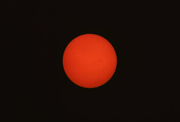 The morning sun taken over Ottawa, Canada June 6, 2023 with sunspots due to forest fires from Ontario and Quebec, Canada