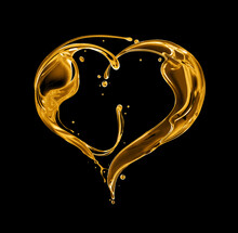 Olive Or Engine Oil Splashes In The Shape Of A Heart Isolated On A Black Background