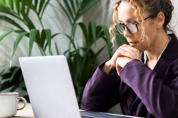 One businesswoman reading notification on laptop seriously and concentrated. Concept of people and modern online business activity at the office. Adult lady manager businesswoman lifestyle. Freelance