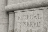 Fototapeta  - Retro style concrete wall engraved with the word FEDERAL RESERVE. Illustration of the concept of the issues and affairs related to federal reserve.