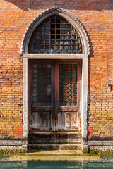 Wall Mural - Typical venetian style door and windows in Venice, Italy