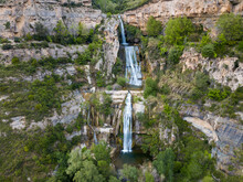View From Drone On Waterfall On Sant Miquel Del Fai In The Spain.