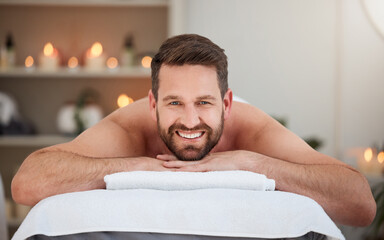 Poster - Portrait, relax and massage with a man lying in spa for wellness treatment at a luxury resort for health. Bed, care or beauty and a happy male customer smile for stress relief with aromatherapy
