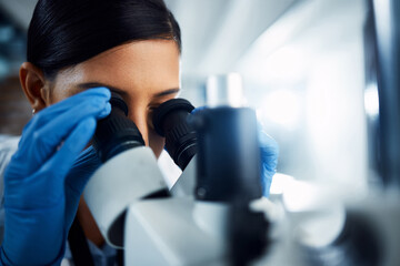 Poster - Woman, scientist and microscope for forensic science research, discovery or data analysis at lab. Female person, medical professional and scientific results for cure, virus or vaccine in laboratory