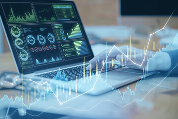 Poster - Close up of male hand using laptop computer at workplace with glowing candlestick forex chart on blurry background. Trade, finance and technology concept. Double exposure.