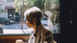 © Marcela Ruty Romero - Savoring the Moment: A Senior Woman Enjoys a Cup of Coffee at a Local Cafe. Generative AI