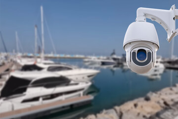 Poster - Pair of outdoor security cameras in yachting harbor.